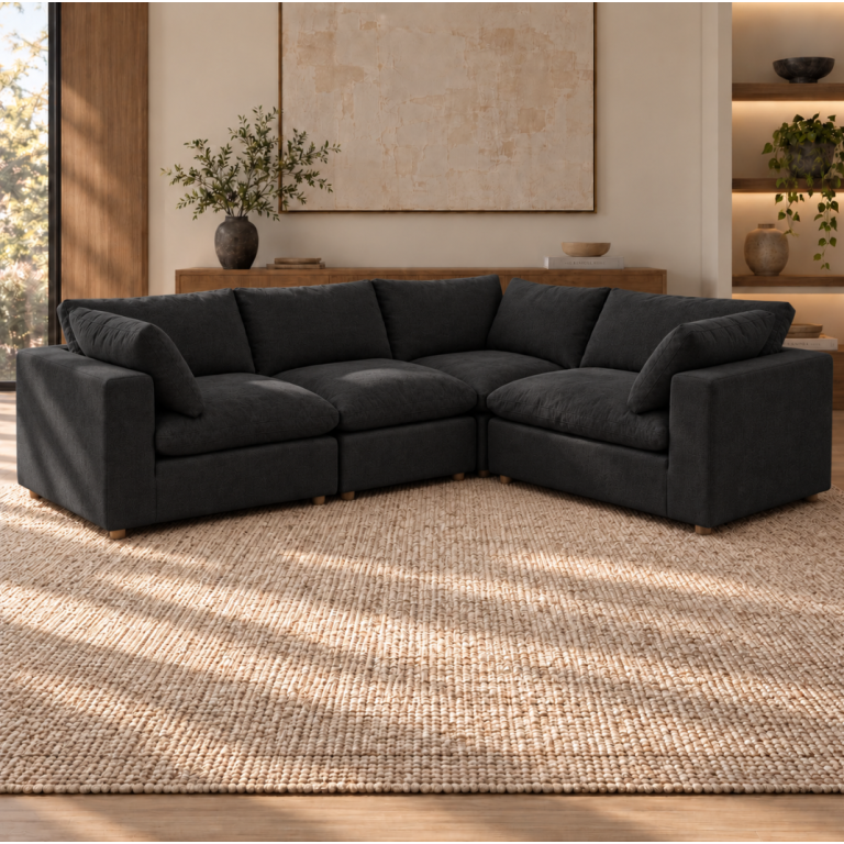 Norwick black down-filled four-piece corner sectional
